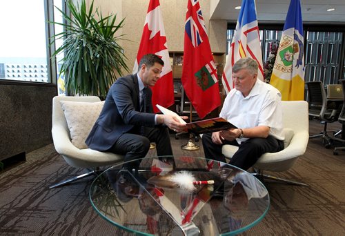 RUTH BONNEVILLE / WINNIPEG FREE PRESS

Come From Away - mayor/mayor

Mayor Claude Elliot who was Mayor of Gander, Nfld in 911,  meets  Winnipeg Mayor, Brian Bowman in his office at City Hall Tuesday.  
Mayor Elliot is in Winnipeg to see the sold out show Come From Away at MTC tonight.  

Jan 09, 2018
