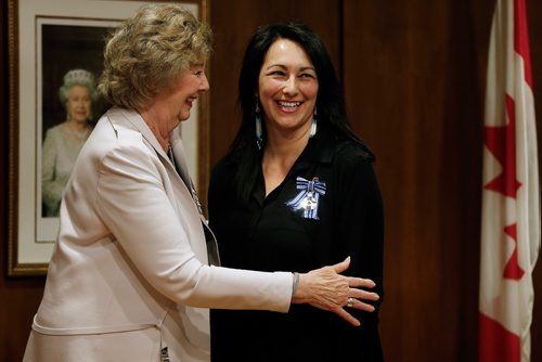 JOHN WOODS / WINNIPEG FREE PRESS
Diane Roussin receives a Meritorius Service Decoration from Lt. Gov. Janice Filmon during the Governor General's Awards for Outstanding Indigenous Leadership at Government House Tuesday, January 9, 2018.