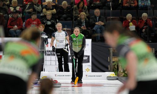 PHIL HOSSACK / Winnipeg Free Press - SCOTTIES - Skip Tiffany McLean watches her sweepers bring the rock in Wednesday in Killarney.  January 10, 2018