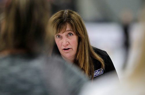 PHIL HOSSACK / Winnipeg Free Press - SCOTTIES - Skip Joelle Brown seeks the advice of her team mates on the next shot in Killarney Wednesday. January 10, 2018