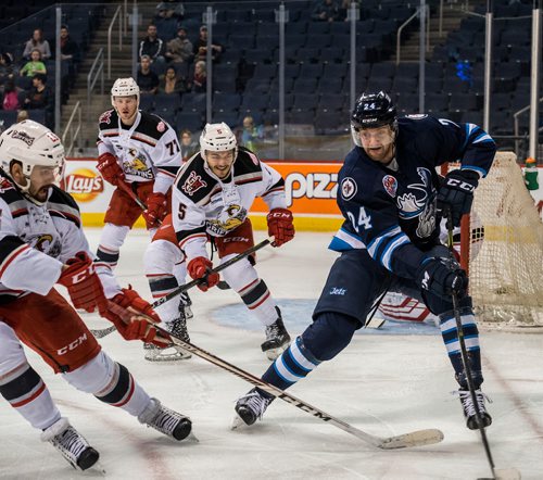 DAVID LIPNOWSKI / WINNIPEG FREE PRESS

Manitoba Moose Cam Maclise (#24) jostles for the puck against the Grand Rapids Griffins during second period action at Bell MTS Place Wednesday January 10, 2018.
