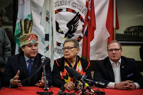 MIKE DEAL / WINNIPEG FREE PRESS
(from left) Grand Chief Jerry Daniels of the Southern Chiefs' Organization, Chief Jim Bear of the Brokenhead Ojibway Nation, and MLA Scott Fielding Minister of Families surrounded by chiefs on the left and grandmothers on the right at a press conference regarding a special summit that the Southern Chiefs Organization held regarding Child and Family Services.
180111 - Thursday, January 11, 2018.