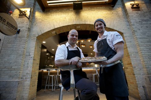RUTH BONNEVILLE / WINNIPEG FREE PRESS

Restaurant Review.
Steffen Zinn (left) and Quin Fergusson (hat) are co-owners of Red Ember, a  neo Neopolitan style pizza restaurant  made with fresh, locally sourced ingredients located at the Forks.  

Jan 12, 2018
