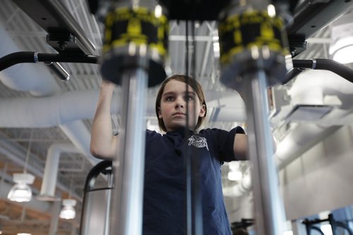 RUTH BONNEVILLE / WINNIPEG FREE PRESS

Ximon Webster tries out some of the equipment at the Sport For Life Centre Saturday during their Free Fitness Day open House.  

Standup 
Jan 13, 2018
