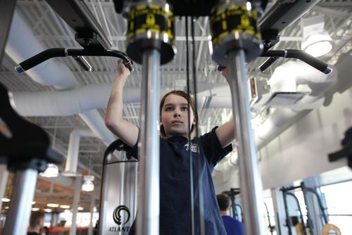RUTH BONNEVILLE / WINNIPEG FREE PRESS

Ximon Webster tries out some of the equipment at the Sport For Life Centre Saturday during their Free Fitness Day open House.  

Standup 
Jan 13, 2018
