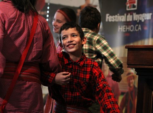 RUTH BONNEVILLE / WINNIPEG FREE PRESS

Nine-year-old Jasmin Normandeu is all smiles as he kicks up his heels with his family at the launch of the 49th annual Festival du Voyageur at a news conference at Fort Gibraltar Tuesday.  
(His sister, Marie-Ève (14yrs) and Marc-André (11yrs), can also be seen in photo).  
Sse Alex Paul story.  
Jan 16, 2018
