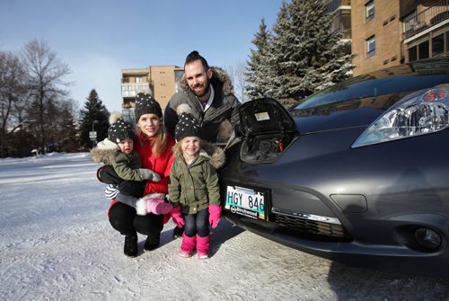 RUTH BONNEVILLE / WINNIPEG FREE PRESS

Green Page: electric/hybrid vehicles in Winnipeg.
Photo of  Peter and Shannon Cavey along with their two daughters, Scarlett (older) and Ophelia, standing next to  their electric vehicle. 

See Dave Baxter story


Jan 15, 2018
