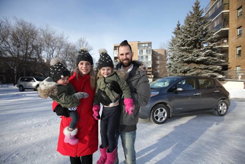 RUTH BONNEVILLE / WINNIPEG FREE PRESS

Green Page: electric/hybrid vehicles in Winnipeg.
Photo of  Peter and Shannon Cavey along with their two daughters, Scarlett (older) and Ophelia, standing next to  their electric vehicle. 

See Dave Baxter story


Jan 15, 2018
