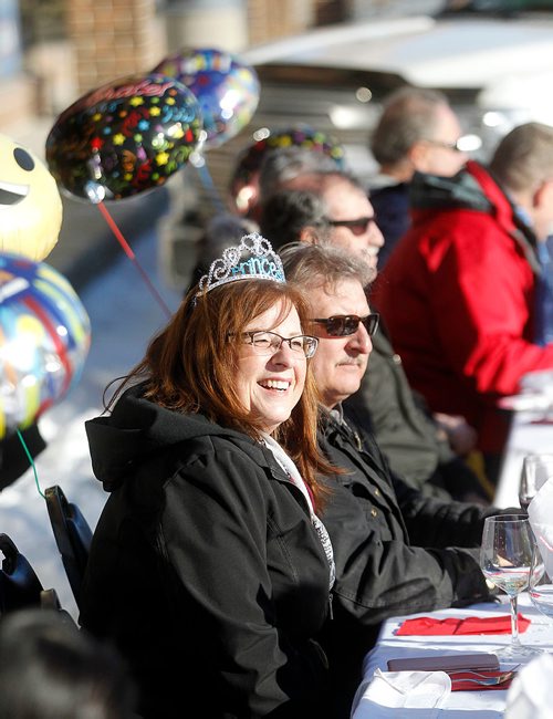 PHIL HOSSACK / Winnipeg Free Press - Patrons enjoy a warm sunny afternoon Wednesday afternoon at the 34th annual Polar Bear Lunch hosted by Arnaldo Carreira in front of his restraunt at 2015 Portage ave. (Gus and Tony's). -  January 17, 2018