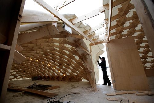 RUTH BONNEVILLE / WINNIPEG FREE PRESS

On Tuesday a worker pulls a tarp over the unique architectural design frame of Raw Almond, a annual  pop-up restaurant set up on the frozen Red River at the Forks which opens tomorrow and runs Feb 19/18.  Each night the restaurant hosts a wide array of guest chefs that usually sell out each year.  
Standup photo 

Jan 18, 2018
