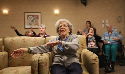 RUTH BONNEVILLE / WINNIPEG FREE PRESS

Residences of Shaftesbury Park take part in various activities Thursday like archery and zumba class during Spirit Week in preparation of the  9TH ANNUAL asc SENIORS gAMES
 Mavis Rabkin helps lead other seniors  sitting behind her as they take part in a Zumba class Thursday.  
Canada Seniors Games (February 5th - 9th, 2018), is when thousands of seniors will enjoy an environment of friendly competition while staying healthy and having fun during the winter months at 29 All Seniors Care Living Centres across Canada.
 
Standup photo 

Jan 18, 2018
