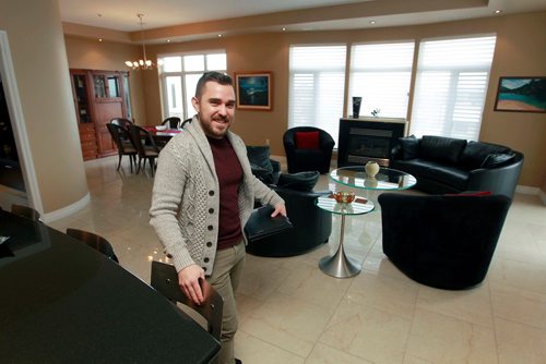 BORIS MINKEVICH / WINNIPEG FREE PRESS
2017 was record setting year for $1-million plus condo sales in the city. 290 Waterfront is a condo currently listed for more than $1-million. In this photo agent Julien Cloutier poses for a photo in the unit. To go with Monday morning real estate column. January 19, 2018