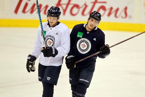 BORIS MINKEVICH / WINNIPEG FREE PRESS
Winnipeg Jets practice at Bell MTS Place. From left, Jet's #52 Jack Roslovic and #13 Brandon Tanev. Mike Sawatzky Story. January 19, 2018