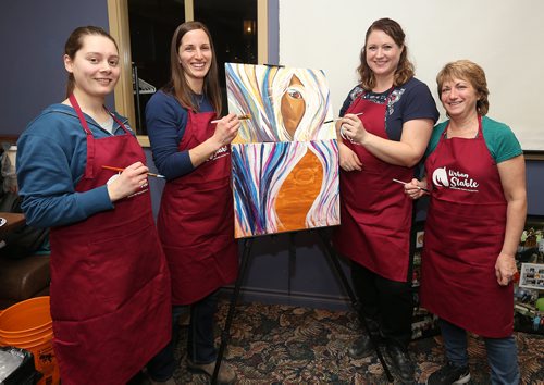 JASON HALSTEAD / WINNIPEG FREE PRESS

L-R: Staff members Tavia McKinnon (assistant trainer and driver), Carla Bergen (head instructor), Hayley Edwards (program director) and Wendy MacDonald (executive director) at Urban Stable's paint party fundraiser on Jan. 18, 2018 at Triple B's Bar and Billiards on Scurfield Boulevard. (See Social Page)