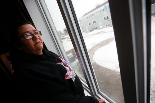 JOHN WOODS / WINNIPEG FREE PRESS
Mary Burton, who works to empower people who are in the Child and Family Services (CFS) system, is photographed in her Winnipeg home Sunday, January 21, 2018. Burton co-founded Fearless R2W three years ago,  which supports CFS clients and is named after the North End postal code frequently visited by Child and Family Services agents.