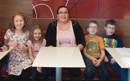 Canstar Community News (From left) 11-year-old Abigail Stewart, this year's Children's Hospital Child Champion, with her sister Savannah, mother Ashley, and brothers Zachary and Gabriel. (SHELDON BIRNIE/CANSTAR/THE HERALD)
