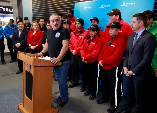 BORIS MINKEVICH / WINNIPEG FREE PRESS
Mayor Bowman, far right, announced new funding to support downtown foot patrols, Bear Clan Patrol and Take Pride Winnipeg at Portage Place Mall. James Favel, Bear Clan Patrol speaks at the podium. January 23, 2018