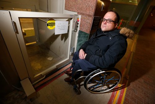 JOHN WOODS / WINNIPEG FREE PRESS
Allen Mankewich is bringing attention to an out of order elevator in in the course under Portage and Main in Winnipeg Tuesday, January 23, 2018. The elevator has been broken for a week and means some people with disabilities can't cross the stairs.