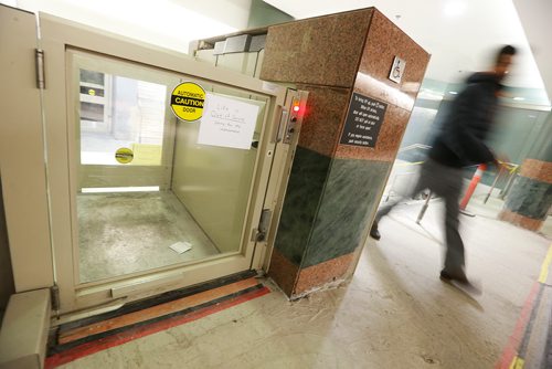 JOHN WOODS / WINNIPEG FREE PRESS
Allen Mankewich is bringing attention to an out of order elevator in in the course under Portage and Main in Winnipeg Tuesday, January 23, 2018. The elevator has been broken for a week and means some people with disabilities can't cross the stairs.