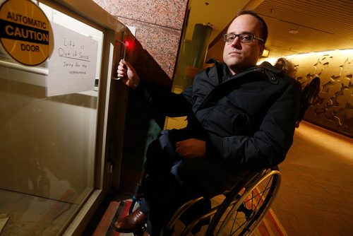 JOHN WOODS / WINNIPEG FREE PRESS
Allen Mankewich is bringing attention to an out of order elevator in in the course under Portage and Main in Winnipeg Tuesday, January 23, 2018. The elevator has been broken for a week and means some people with disabilities can't cross the stairs.