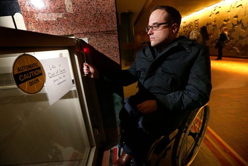 JOHN WOODS / WINNIPEG FREE PRESS
Allen Mankewich is bringing attention to an out of order elevator in in the course under Portage and Main in Winnipeg Tuesday, January 23, 2018. The elevator has been broken for a week and means some people with disabilities can't cross the stairs.