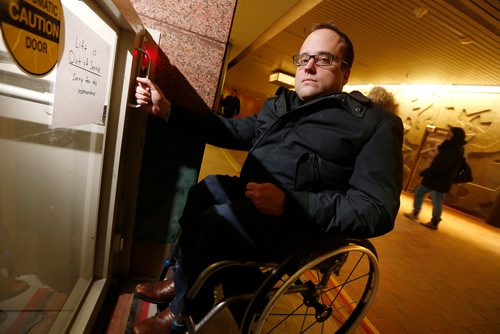 JOHN WOODS / WINNIPEG FREE PRESS
Allen Mankewich is bringing attention to an out of order elevator in in the course under Portage and Main in Winnipeg Tuesday, January 23, 2018. The elevator has been broken for a week and means some people with disabilities can't cross the stairs.