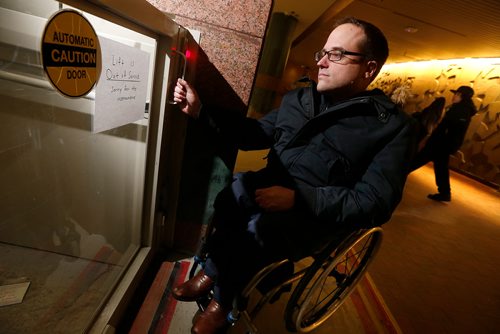 JOHN WOODS / WINNIPEG FREE PRESS
Allen Mankewich is bringing attention to an out of order elevator in in the course under Portage and Main in Winnipeg Tuesday, January 23, 2018. The elevator has been broken for a week and means some people with disabilities can't cross the stairs.