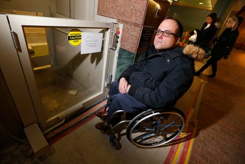 JOHN WOODS / WINNIPEG FREE PRESS
Allen Mankewich is bringing attention to an out of order elevator in in the course under Portage and Main in Winnipeg Tuesday, January 23, 2018. The elevator has been broken for a week and means some people with disabilities can't cross the stairs.