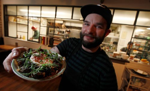 PHIL HOSSACK / Winnipeg Free Press -  Sous Chef Paul Eccles shows off the Clementine's offering of Brussels Sprouts. See Sanderson's story.  -  January 23, 2018