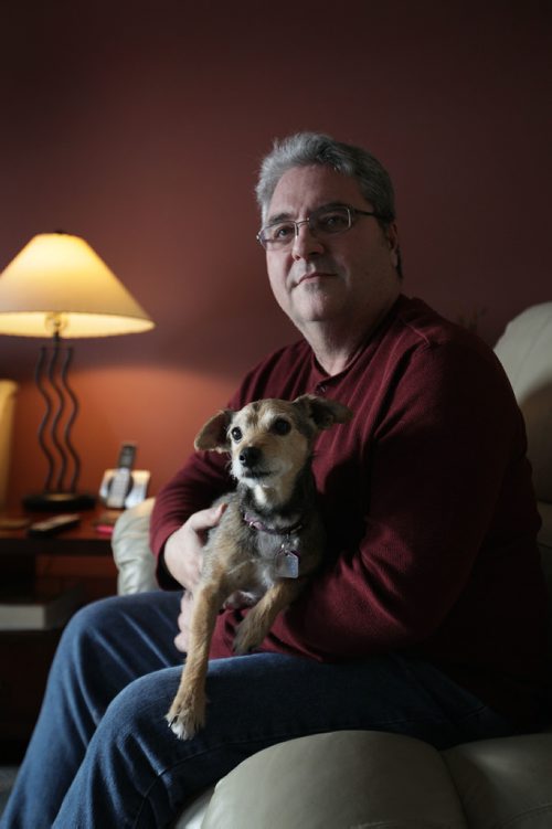 RUTH BONNEVILLE / WINNIPEG FREE PRESS

Feature:  Lewy Body dementia 
Photos at home of Sandy and her husband Doug McLean , 61, who has Lewy Body dementia (first noticed changes in his mid-50s). They are still living together and use home care services. 
Photo of Doug in a quiet moment with his dog.

See Carol Sanders  | Reporter 

Jan 23, 2018
