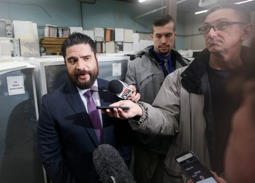 PHIL HOSSACK / Winnipeg Free Press -  Unhappy with the minister's announcement, Tom Thiessen, Executive Director of the Building Owners and Managers Association, speaks to media after a press conference and announcement by Crown Services Minister Cliff Cullen Wednesday morning. See Nick Martin's story.  -  January 20, 2018