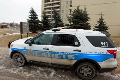 BORIS MINKEVICH / WINNIPEG FREE PRESS
Crime scene at his rise apartments called Lancing Court at 233 Booth Drive. Police and Cadets on scene. St. James. January 24, 2018