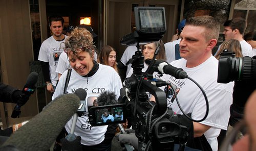 PHIL HOSSACK / WINNIPEG FREE PRESS - A mixture of relief and pain floods the face of Cooper Nemeth's mom Gaylene as she exits the court house Wednesday. Her husband Brent (right) stoic now that the trial and sentencing is done. See Katie-May's story.  -  January 24, 2018