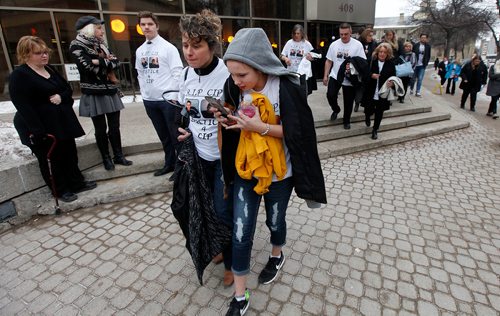 PHIL HOSSACK / WINNIPEG FREE PRESS - Left to right, Cooper Nemeth's mother Gaylene embraces her daughter Kiana (11) as they exit the courthouse post sentecing in their son's murder Wednesday. Coopers Dad Brent follows with other supporters. See Katie-May's story.  -  January 24, 2018