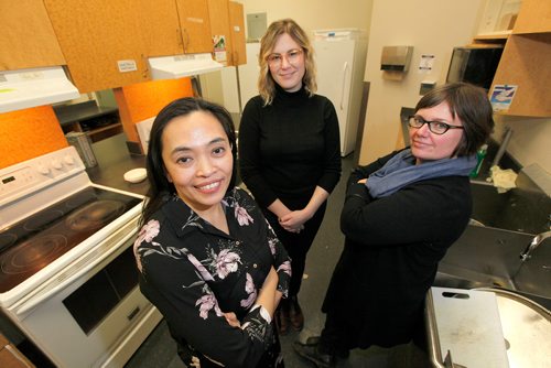 PHIL HOSSACK / WINNIPEG FREE PRESS - Left to Right, Amalia Santiago (Newcomer Nutrition Facilitator), Kelsey Evans (interrim Executive Director and Tyler Pearce (Board Chair) of Food Matters pose in a community Kitchen at Turtle Island Community Centre. See Kevin Rollason's Philanthropy story.  -  January 24, 2018
