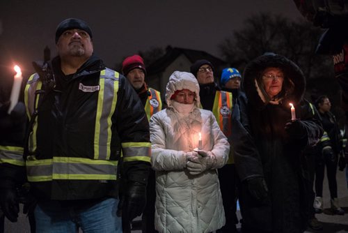 Daniel Crump / Winnipeg Free Press. Attendees of the vigil for Claudette Osborne-Tyo light candles and take a moment to remember all of Canada's missing and murdered indigenous women. January 24, 2018.