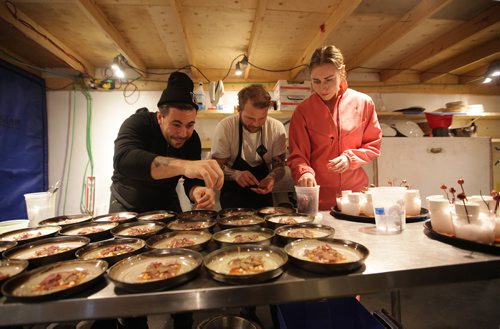 RUTH BONNEVILLE / WINNIPEG FREE PRESS

ENTERTAINMENT FEATURE: RAW ALMOND 
(annual pop-up restaurant located on the Red River at the Forks)

Photo of Mandel Hitzer, one of the co-founders, plating food with Christie Peters and Kyle Michael chefs of the hollows restaurant in Saskatoon.
 

Subject: Jen and Erin are trying out RAW: Almond, Winnipeg's hottest culinary event, for a column Jen is writing for Saturday, as well as for an episode of Bury the Lede. 

One of a large selection of photos of restaurant. including outside, dining rooms, kitchen, chefs at work and Jen.   
See Jen Zoratti's column

Jan 24, 2018
