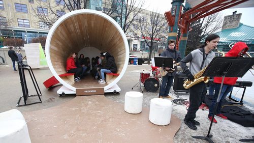MIKE DEAL / WINNIPEG FREE PRESS
Students from the Mennonite Brethren Collegiate Institute gather inside their creation #Hugmug at The Forks.
180126 - Friday, January 26, 2018