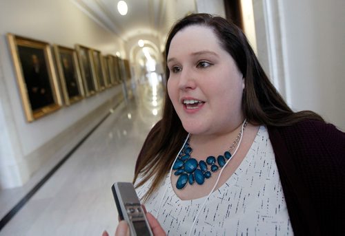 PHIL HOSSACK / Winnipeg Free Press - Chantel Bage, a speaker, organizer and a participant in the Equal Voice Boot Camp at the Legislature Saturday speaks about the event in a hallway lined with portraits of men, former speakers of the Legislature. Alex Paul's story.  -  January 27, 2018