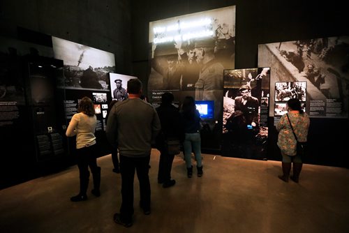 JOHN WOODS / WINNIPEG FREE PRESS
People view content in the Holocaust and genocide gallery at The Canadian Museum for Human Rights (CMHR) in Winnipeg Sunday, January 28, 2018. International Holocaust Remembrance Day is commemorated annually by the United Nations on January 27, the anniversary of the liberation of Auschwitz.