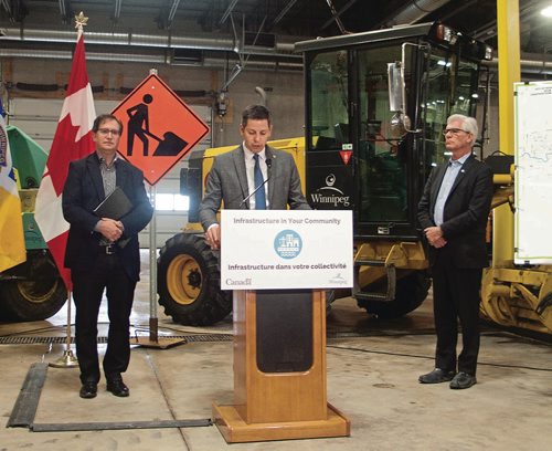 Canstar Community News Jan. 24, 2018 - Coun. Marty Morantz (Charleswood-Tuxedo), mayor Brian Bowman and MP Jim Carr (Winnipeg South) announced 150 road projects for the 2018 local street renewal program at the City's East Yards Complex (980 Thomas Ave.). (SHELDON BIRNIE/CANSTAR/THE HERALD)