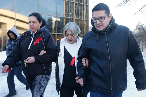 JOHN WOODS / WINNIPEG FREE PRESS
Thelma Favel (C) and Brian Favel (R), Tina Fontaine's aunt and uncle, leave the law courts with unidentified family members after the first day of testimony in the 2nd degree murder trial of Raymond Cormier, Fontaine's alleged killer, in Winnipeg Monday, January 29, 2018.