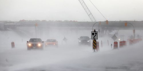 PHIL HOSSACK / WINNIPEG FREE PRESS - Traffic moves slowly at Hwy 59 and the North Perimeter Tuesday afternoon as increasing winds and blowing snow hampered visibility. At least three school divisions were forced to cancel bus rides home for students due to the weather.  - January30, 2017