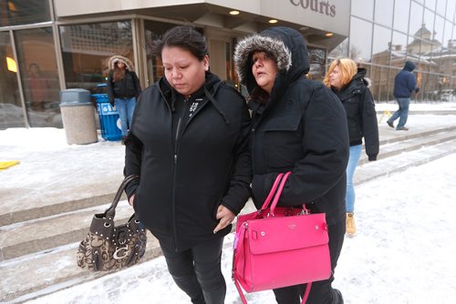 JOHN WOODS / WINNIPEG FREE PRESS
Tina Duck (L),  Tina Fontaine's mother, leaves the law courts with an unidentified person after the second day of testimony in the 2nd degree murder trial of Raymond Cormier, Fontaine's alleged killer, in Winnipeg Tuesday, January 30, 2018.