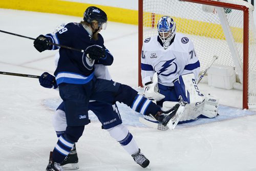 JOHN WOODS / WINNIPEG FREE PRESS
Winnipeg Jets' Patrik Laine (29) attempts to tip the puck past Tampa Bay Lightning's goaltender Louis Domingue (70) during first period NHL action in Winnipeg on Tuesday, January 30, 2018.