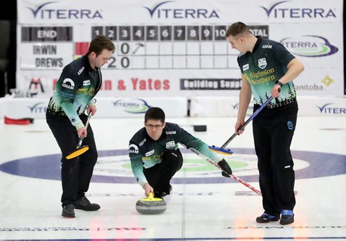 TREVOR HAGAN / WINNIPEG FREE PRESS
Skip Tyler Drews, from the Fort Rouge Curling Club, throwing a rock with Jake Zelenewich and Daryl Evans prepared to sweep, at the Viterra Championships in Winkler, Wednesday, January 31, 2018.