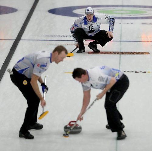 TREVOR HAGAN / WINNIPEG FREE PRESS
Skip Steve Irwin, from the Brandon Curling Club, with Travis Brooks and Travis Saban sweeping, at the Viterra Championships in Winkler, Wednesday, January 31, 2018.