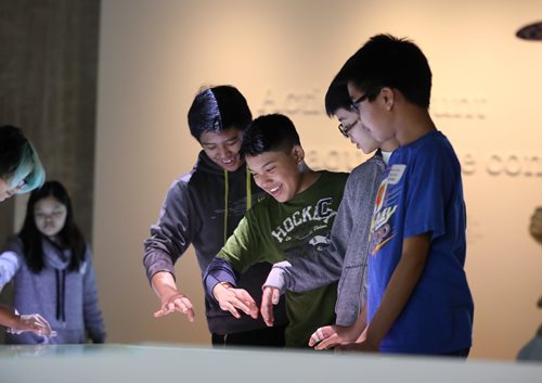 RUTH BONNEVILLE / WINNIPEG FREE PRESS

Students learn teamwork in the Actions Count gallery at museum.
CMHR hosted schools from across Winnipeg to an event called 
DisruptEd Thursday.  This free youth event invited students to browse the galleries and learn how to share their experiences on social media platforms in a way that promoted empathy and teamwork and learn about social and emotional intelligence as necessary skills for the future of work.  Students had to discover stories within the Museums exhibits through clues while using a variety of social media platforms to share these stories online. Twelve junior and senior high schools in Winnipeg participated in event Thursday.  
Standup photo 
Feb 01, 2018
 

