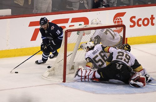 RUTH BONNEVILLE / WINNIPEG FREE PRESS

Winnipeg Jets center #18 Bryan Little comes around the back of  Vegas Golden Knights net to try and score during 3 on 3 overtime at BellMTS Centre Thursday. The Vegas Golden Knights,  #57 David Perron,  scored on the Jets just seconds later to win the game with a score of  3-2 for the Knights.

Feb 01, 2018
 
