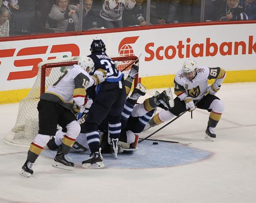 RUTH BONNEVILLE / WINNIPEG FREE PRESS

Winnipeg Jets  #33 Dustin Byfuglien tries to find the puck in the net of the Vegas Golden Knights during  3 on 3 overtime at BellMTS Centre Thursday. The Vegas Golden Knights,  #57 David Perron,  scored on the Jets just seconds later to win the game with a score of  3-2 for the Knights.

Feb 01, 2018
 
